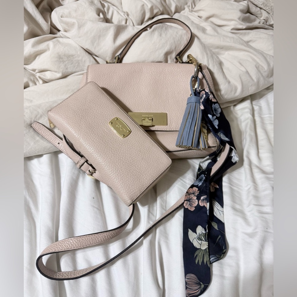 Pink Michael Kors crossbody bag with wallet